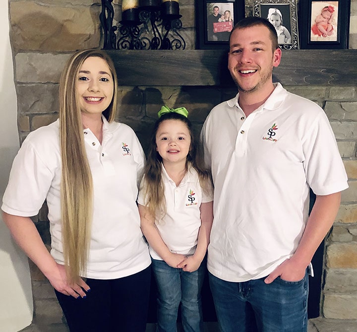 Family photo of the owners of Skeen's Precision Lawn Care.